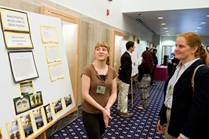 student participating at Illinois Junior Science and Humanities Symposium